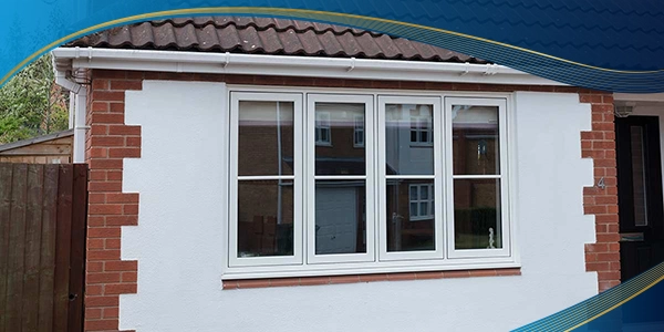 Cửa sổ nhựa lõi thép 4 cánh màu trắng chia đố 1/2 được lắp đặt tại nhà ở