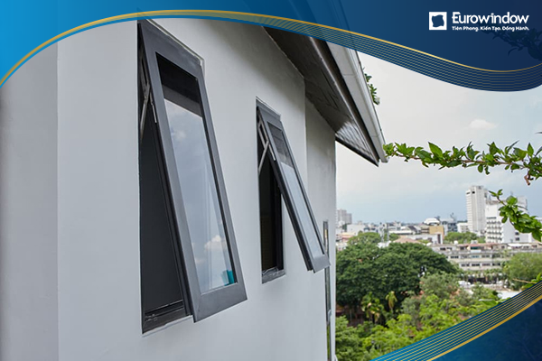 Cửa nhựa lõi thép mở hất 1 cánh màu đen kết hợp kính trong tại 1 văn phòng làm việc ở Quận 7