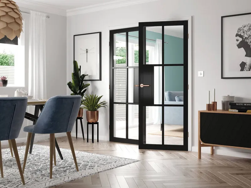 Cửa kính chung cư cho bếp giúp phân tách khu vực nấu nướng nhưng vẫn giữ không gian thông thoáng (Nguồn: Internet)