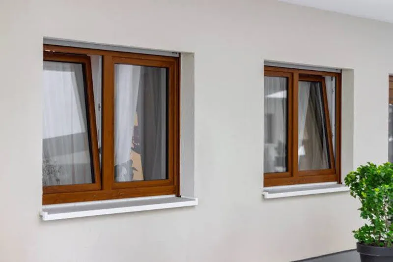 Cửa nhôm màu gỗ 2 cánh mở hất làm cửa sổ