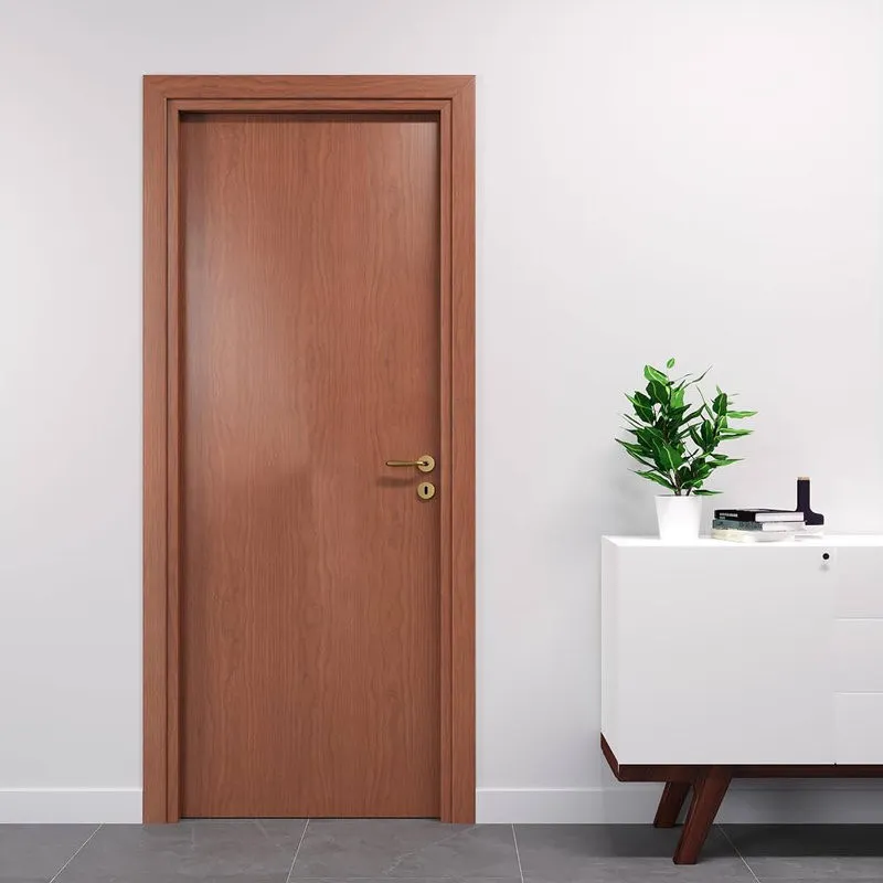 Thiết kế cửa gỗ phẳng giúp tổng thể phòng ngủ gọn gàng và đồng nhất hơn (Nguồn: Internet)