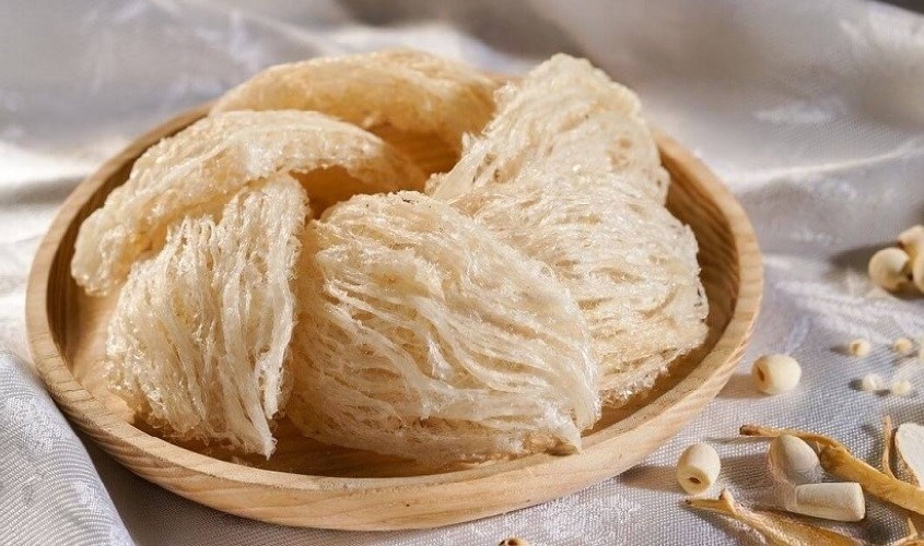 Close-up of green agricultural produce in a basket.