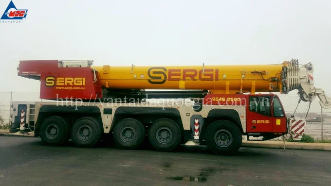 Đáp ứng các nhu cầu, tiêu chuẩn khắt khe về an toàn và tiến độ của khách hàng, Công ty Cổ phần Vận tải Đa Quốc Gia đã nhập khẩu và đưa vào khai thác cần cẩu bánh lốp Terex Demag AC200-1