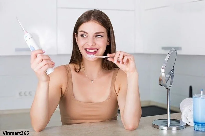 vệ sinh máy tăm nước thường xuyên